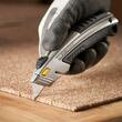 Cutter Stanley cu lama retractabila,180 mm, 3 lame incluse